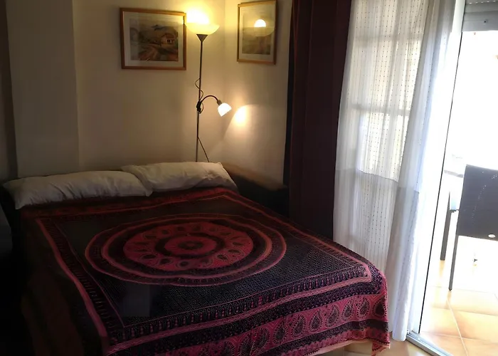 Junto Playa Τορεβιέχα